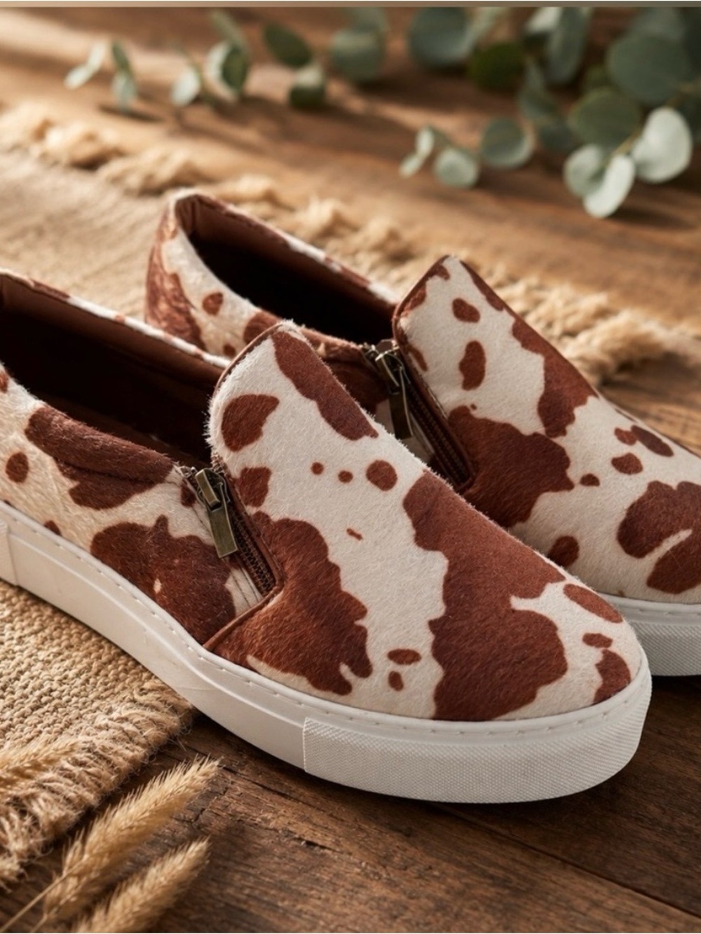 Brown and White Cow Print Slip-On Sneakers
